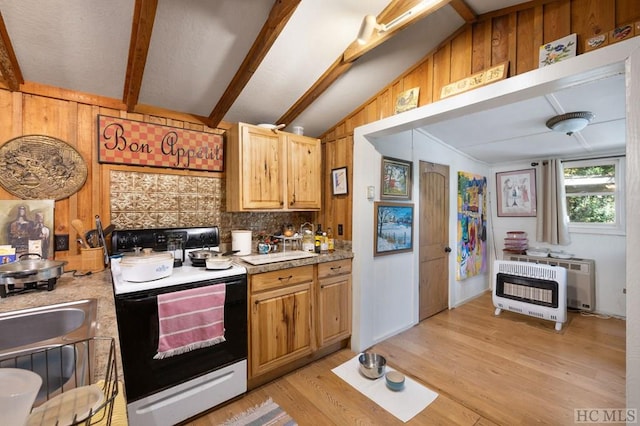 kitchen with electric range oven, backsplash, heating unit, lofted ceiling with beams, and light wood-type flooring