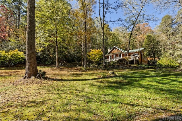 view of yard with a deck