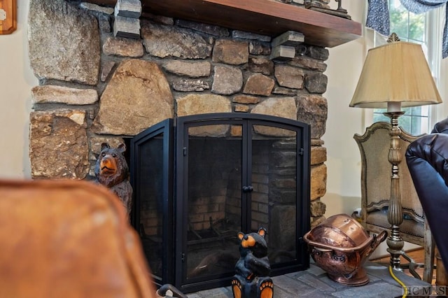 room details with a stone fireplace