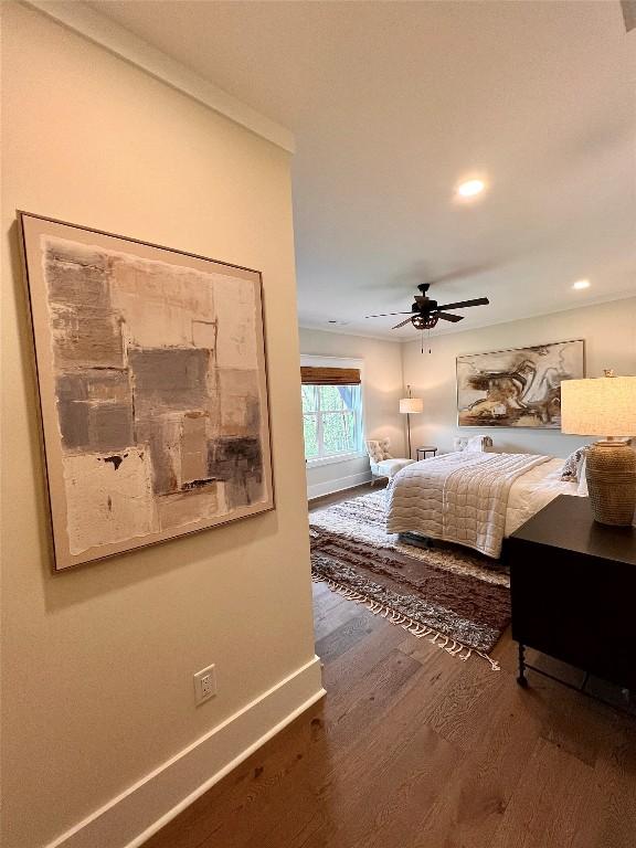 bedroom featuring baseboards, recessed lighting, ceiling fan, and wood finished floors