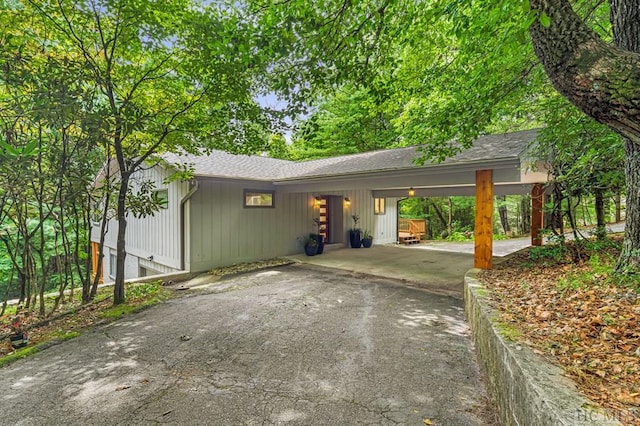 exterior space with a carport