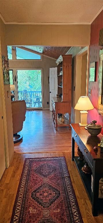 239 Island Point Rd, Lake Toxaway, NC 28747 - hall featuring wood finished floors, ornamental molding, and wood walls