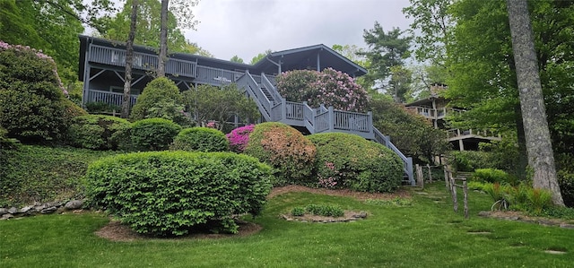239 Island Point Rd, Lake Toxaway, NC 28747 - view of grassy yard featuring stairs and a deck