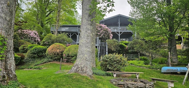 239 Island Point Rd, Lake Toxaway, NC 28747 - rear view of property with a yard and stairs