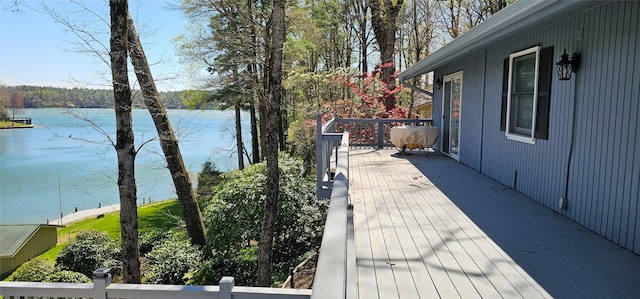 239 Island Point Rd, Lake Toxaway, NC 28747 - wooden terrace with a water view