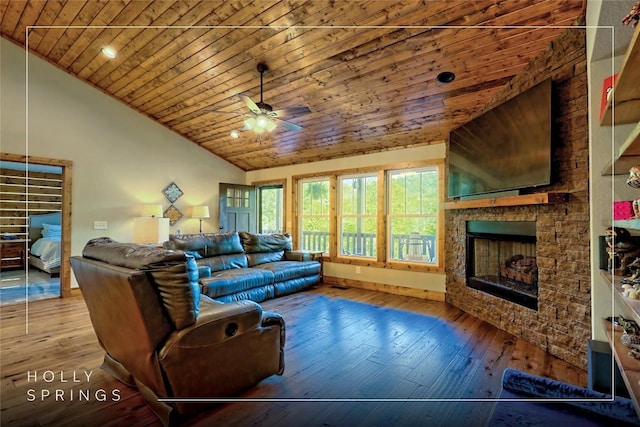 living room featuring a ceiling fan, a stone fireplace, wooden ceiling, high vaulted ceiling, and hardwood / wood-style floors