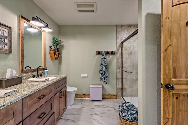 full bathroom featuring a stall shower, marble finish floor, toilet, and visible vents