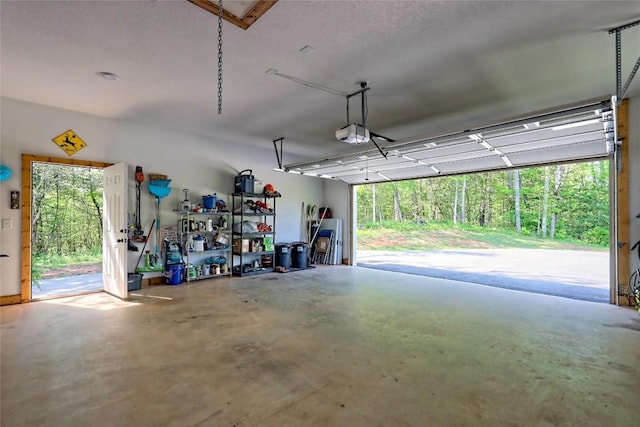 garage featuring a garage door opener