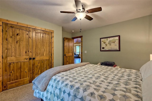 bedroom featuring carpet floors and a ceiling fan
