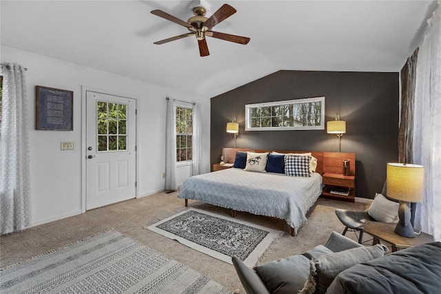 bedroom with ceiling fan, baseboards, lofted ceiling, and carpet floors