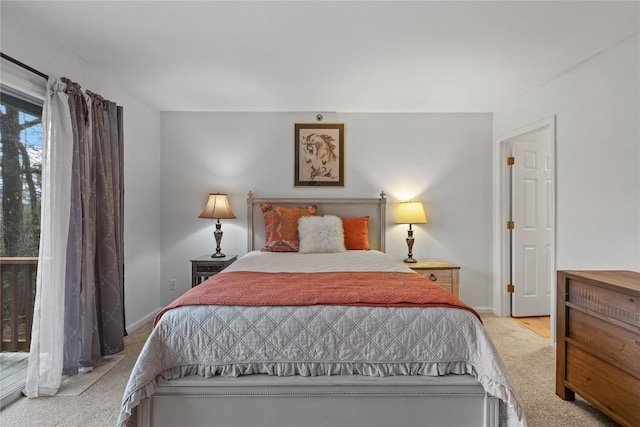 bedroom featuring baseboards and carpet floors
