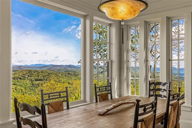 168 Old Wagon Rd, Highlands, NC 28741 - sunroom / solarium featuring a mountain view and crown molding
