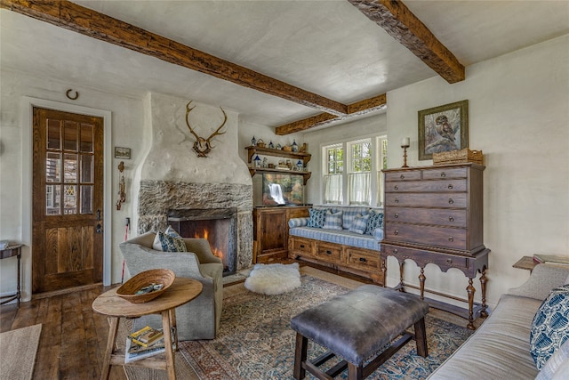 168 Old Wagon Rd, Highlands, NC 28741 - living room with hardwood / wood-style floors, beamed ceiling, and a lit fireplace