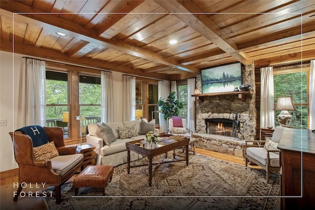 161 Kestrel Ct, Sapphire, NC 28774 - living area featuring a wooden ceiling with exposed beams, hardwood / wood-style flooring, and a stone fireplace