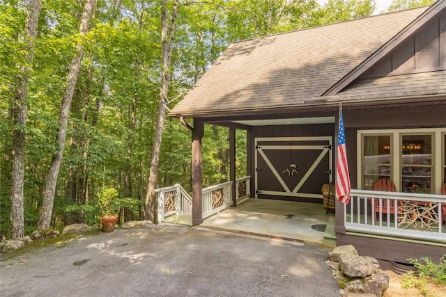 161 Kestrel Ct, Sapphire, NC 28774 - view of parking featuring asphalt driveway