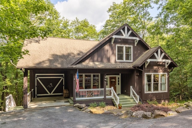 161 Kestrel Ct, Sapphire, NC 28774 - view of front of home with a porch and a shingled roof