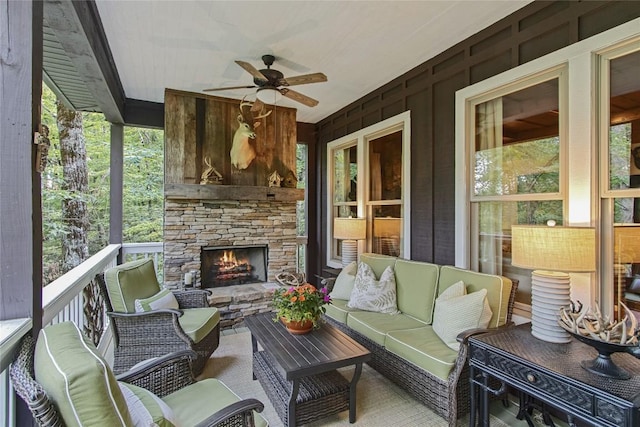 161 Kestrel Ct, Sapphire, NC 28774 - view of patio with ceiling fan and an outdoor living space with a fireplace