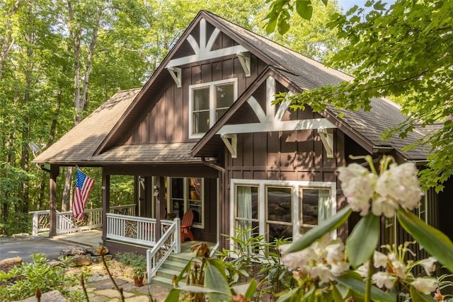 161 Kestrel Ct, Sapphire, NC 28774 - view of front of house with roof with shingles and board and batten siding