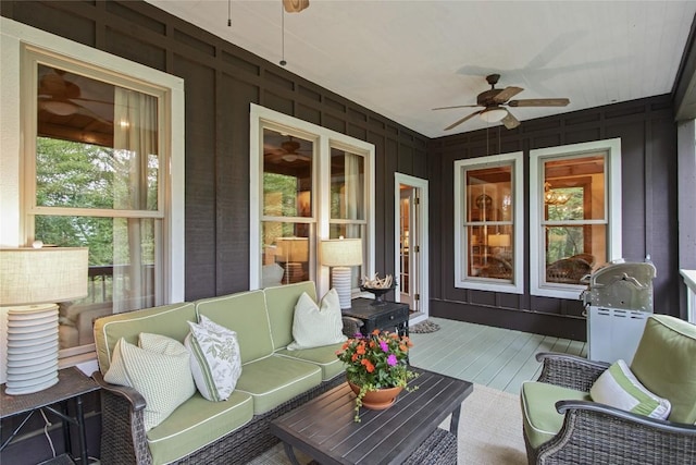 161 Kestrel Ct, Sapphire, NC 28774 - sunroom with a ceiling fan and an outdoor hangout area