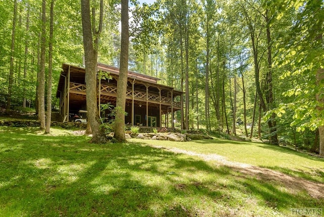 view of yard with a deck