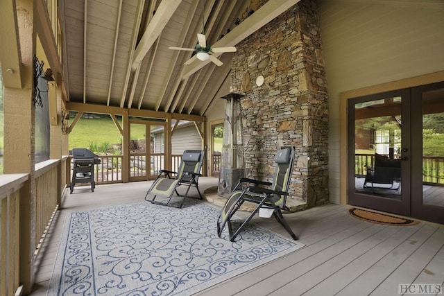 unfurnished sunroom with french doors and vaulted ceiling with beams