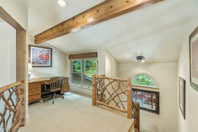 office featuring light carpet and vaulted ceiling with beams