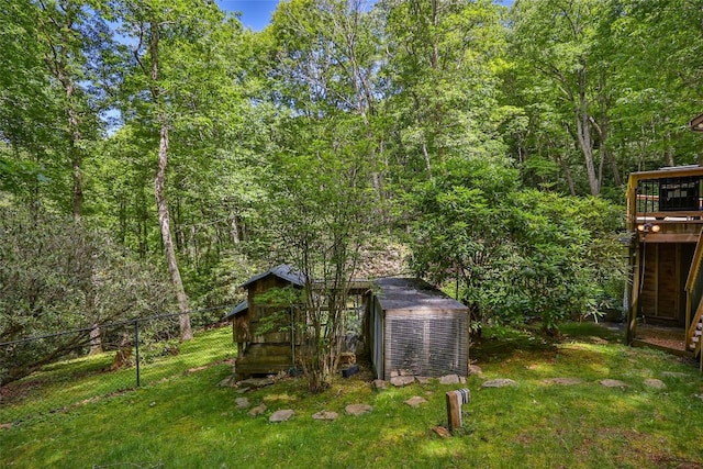 view of outbuilding with a yard