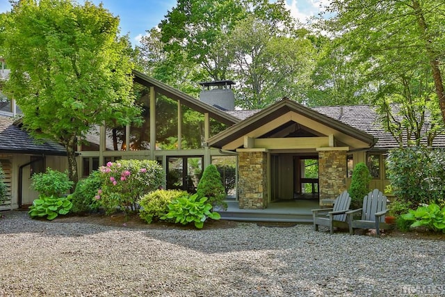 exterior space with a sunroom