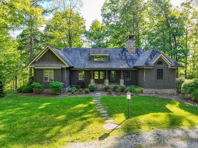 craftsman inspired home with a front yard