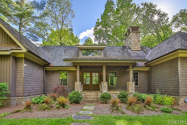 view of exterior entry featuring french doors