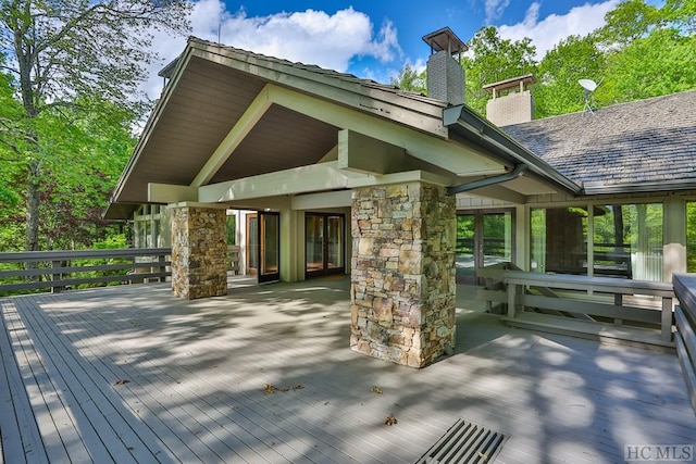 exterior space featuring a wooden deck