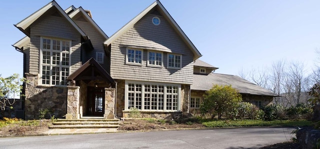 view of front of home featuring stone siding