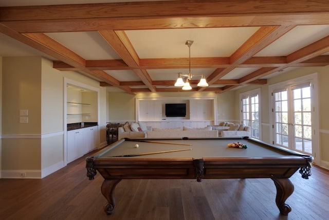 recreation room featuring beam ceiling, coffered ceiling, and wood finished floors