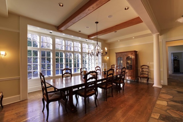 dining space featuring an inviting chandelier, ornate columns, dark wood-style flooring, and beamed ceiling