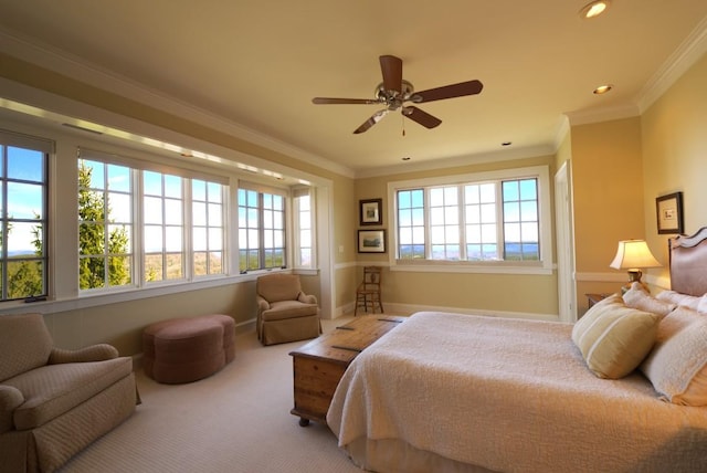 carpeted bedroom featuring baseboards, ceiling fan, recessed lighting, and crown molding