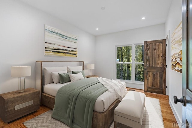 bedroom featuring light hardwood / wood-style flooring