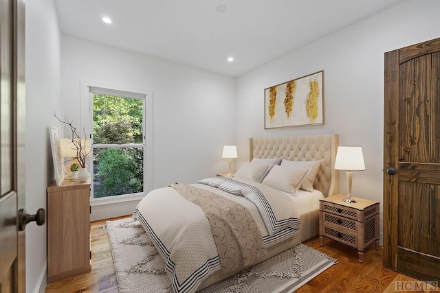 bedroom featuring hardwood / wood-style floors