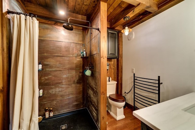 bathroom featuring toilet, curtained shower, and wooden ceiling