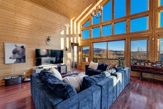 living room featuring high vaulted ceiling, dark hardwood / wood-style floors, and wood ceiling