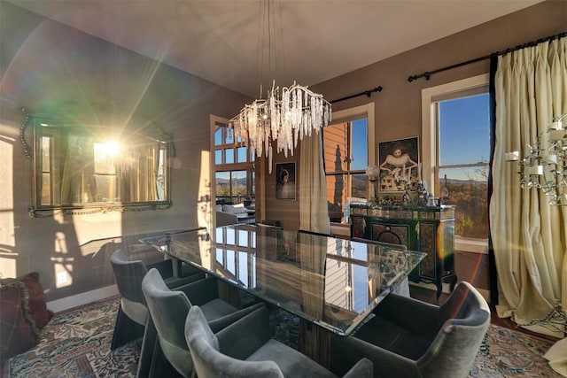 dining space with an inviting chandelier and plenty of natural light