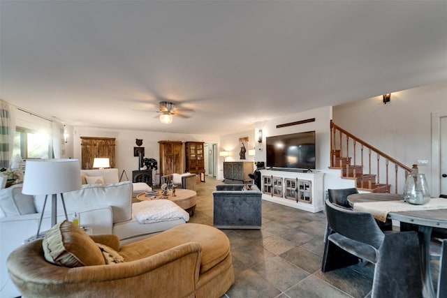 living room featuring ceiling fan