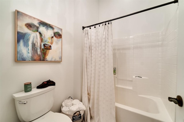 bathroom featuring shower / bath combination with curtain and toilet