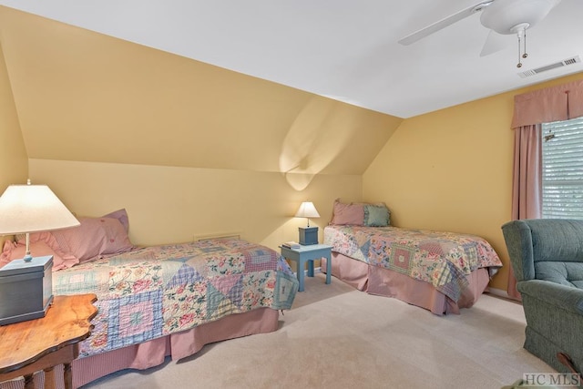 bedroom with light carpet, lofted ceiling, and ceiling fan