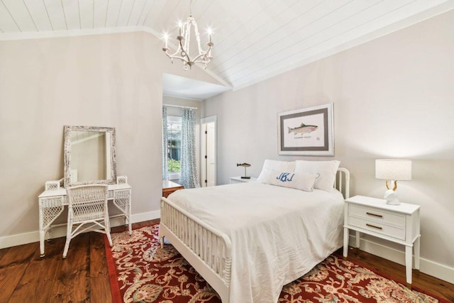 bedroom with a chandelier, wooden ceiling, baseboards, wood finished floors, and lofted ceiling