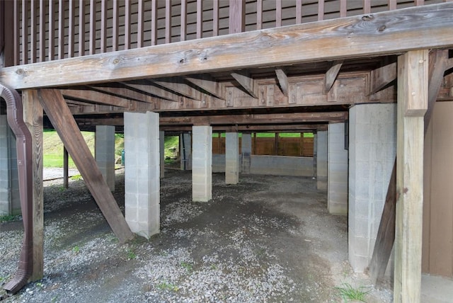 view of car parking featuring an exterior structure and a carport