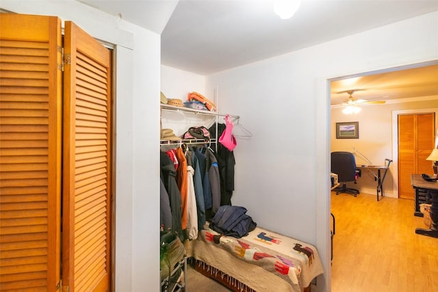 bedroom with a closet and wood finished floors