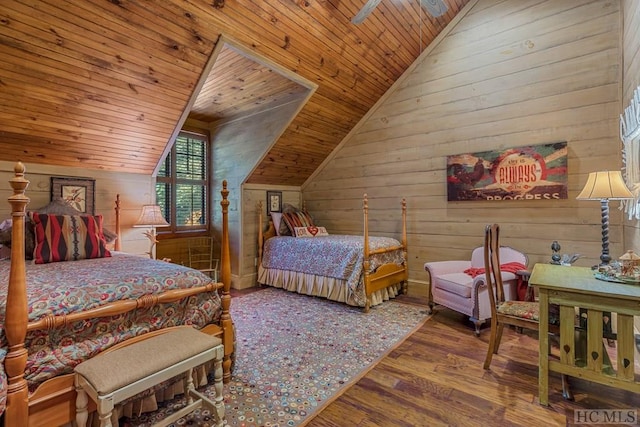 bedroom featuring hardwood / wood-style flooring, wood walls, vaulted ceiling, and wooden ceiling