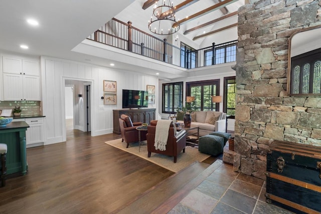 248 Drystack Way, Cashiers, NC 28717 - living room with a chandelier, high vaulted ceiling, dark wood finished floors, recessed lighting, and beamed ceiling