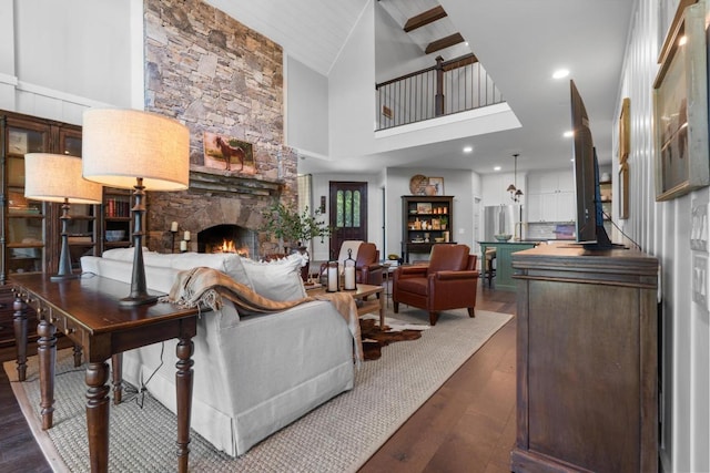 248 Drystack Way, Cashiers, NC 28717 - living area with a fireplace, dark wood-style flooring, and high vaulted ceiling