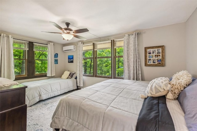 38 Lonely Mountain Dr Unit 24-A, Sapphire, NC 28774 - bedroom featuring a wall mounted air conditioner, ceiling fan, and carpet flooring